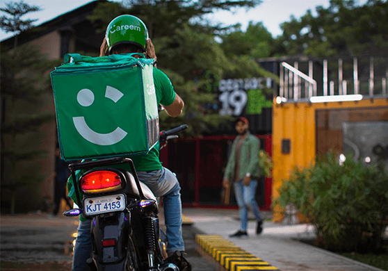 Indivíduo de Careem em bicicleta