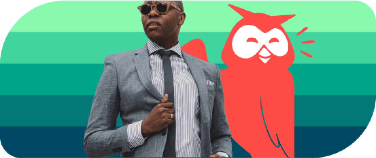 Stylish man in suit next to Owly